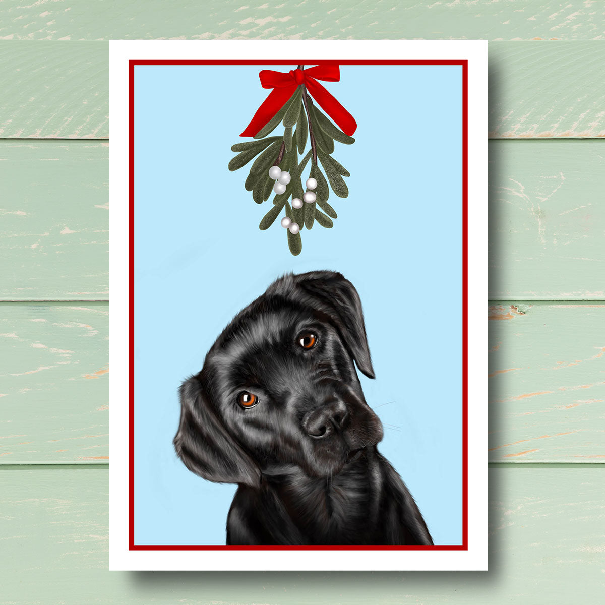 Black Labrador under Mistletoe Christmas card by Oundle Artist Kitty's Art