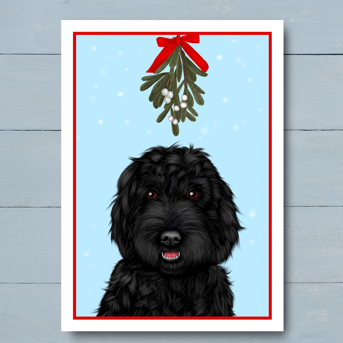 Black Cockapoo under Mistletoe