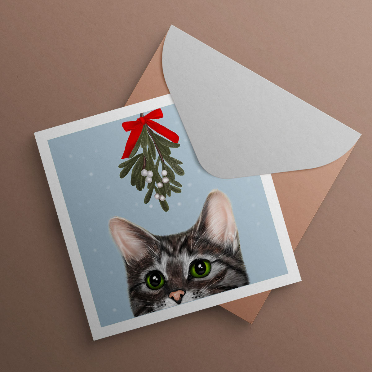 Tabby cat under mistletoe Christmas card by Oundle Artist Kitty's Art