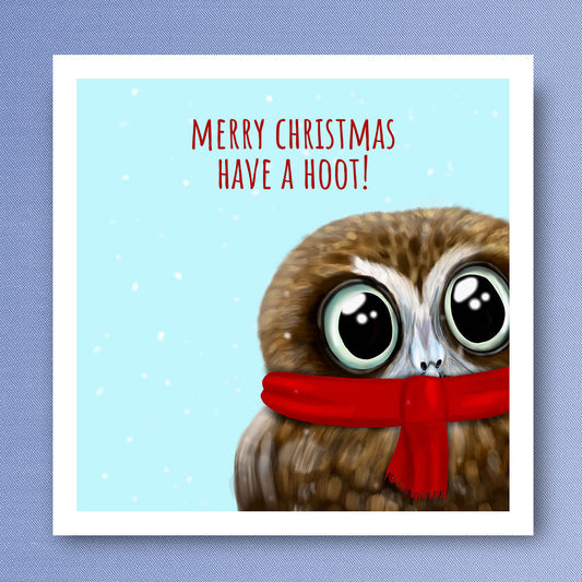 Owl wearing scarf with text Merry Christmas have a hoot. Christmas Card illustrated by Oundle Artist Kitty's Art